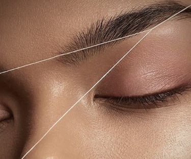 a woman with a WAXING WITH THREAD brow