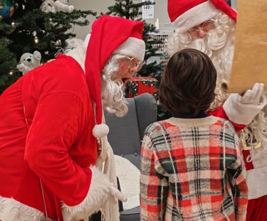 Santa Claus meeting children at Nature Dream Days Christmas Village Finland