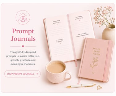 Pink aesthetic gratitude journal with writing prompts, a cup of coffee, and flowers for daily reflection.