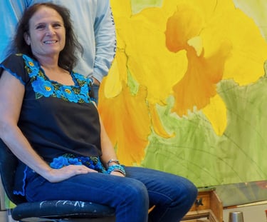 Christine Knize with a Painting in Progress