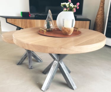 a table with a vase and vases on it