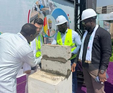 a group of men standing around a cement block