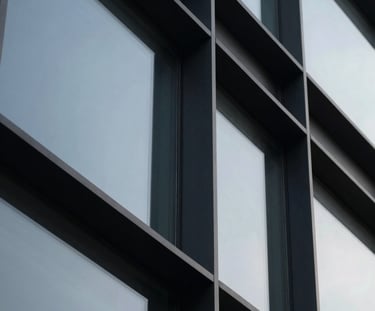 A modern corporate building facade representing scalable digital transformation and web platforms.