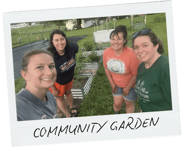 Laura McHugh and friend volunteering at Community Garden, candidate for Marshall County Commissioner