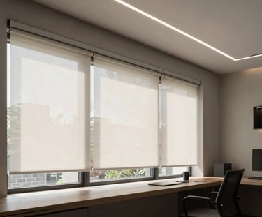 Modern minimalist home office during daytime, automated roller shades partially open letting soft natural light in, cool white linear LED accents in the ceiling