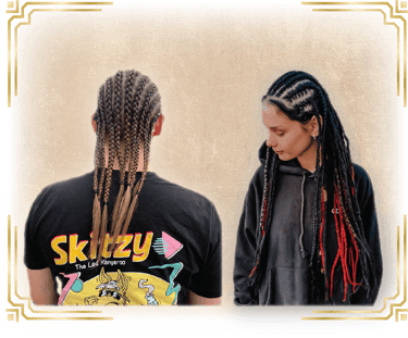 a man and a women with cornrows