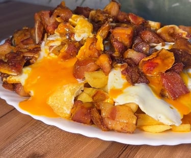 Huevos rotos con oreja