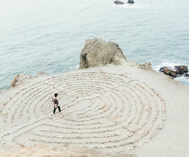 a man walking through a labyrinth