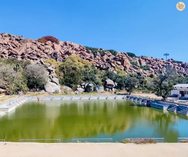 Pampa Sarovar, the sacred lake in Kishkindha, Hampi, surrounded by serene landscapes.