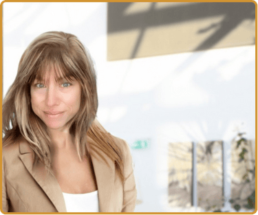 image of Cortney Duval in tan work jacket and white shirt