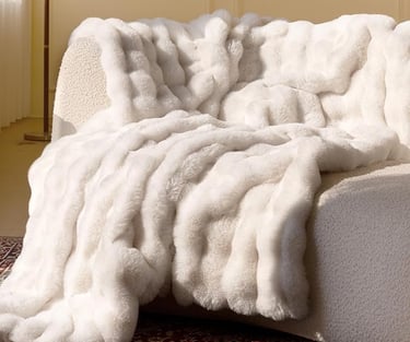 a couch with a blanket on it
