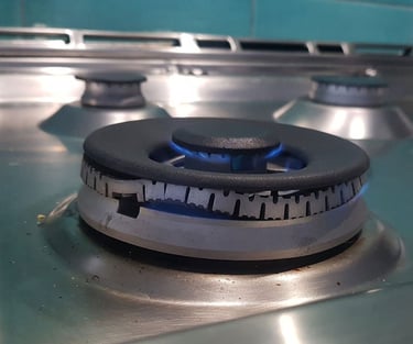 A bent gas burner on the gas stove