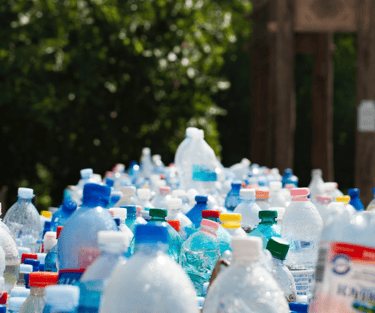 A table with plastic bottles of water 