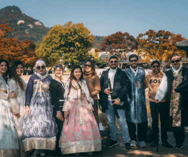Vitatech members wearing traditional Korean Hanbok dresses at Julia Summit - Korea
