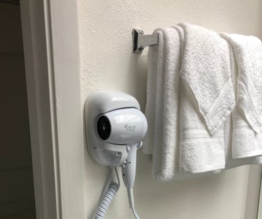 a hair dryer is shown in a bathroom
