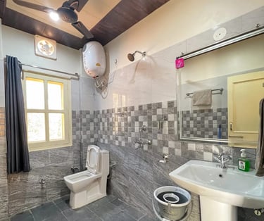 bathroom at Green Acres Homestay