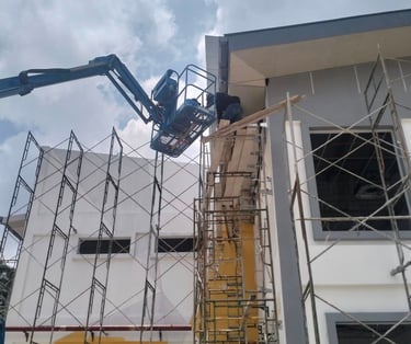 Suasana Renovations exterior building construction, scaffolding, and commercial work.