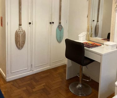 a bedroom with a guitar and guitar shaped guitar
