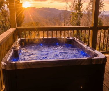 Steaming private hot tub on a secluded wooden deck overlooking the lush forest in Gatlinburg, Tennessee