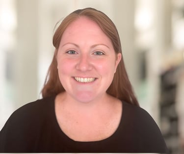 a woman with a smile on her face