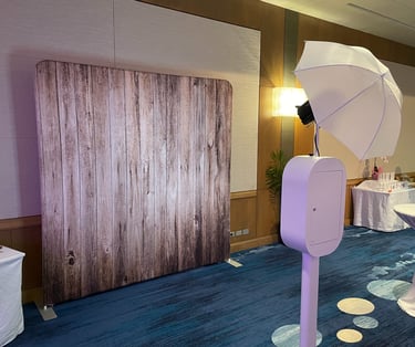 a photo of a photo booth with a white umbrella