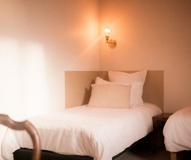 Lits de la chambre hirondelle de la Ferme du Veyre