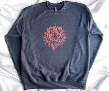 a floral tiger head embroidered onto a gilldan sweatshirt