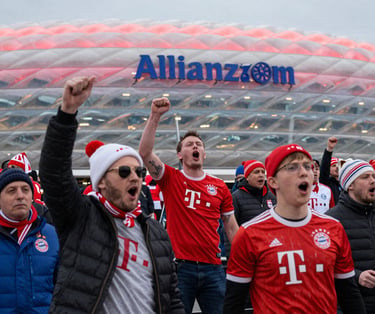 FC Bayern Munich fans cheering outside the Allianz Arena stadium in Germany.