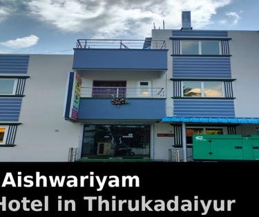 Hotel Aishwariyam building front view best Thirukadaiyur hotel near Abirami Temple with parking