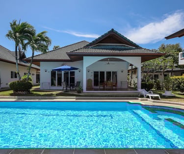Exterior view of Poolside Studio rental with direct pool access