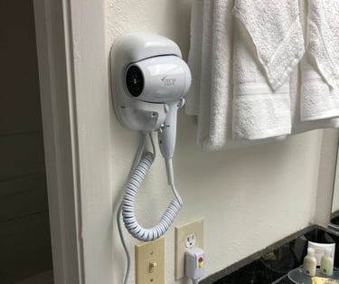 a hair dryer is shown in a bathroom