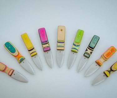 Oyster knives made from skateboard wood