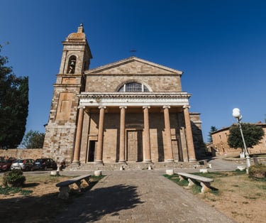 a church with a large stone building with a clock tower