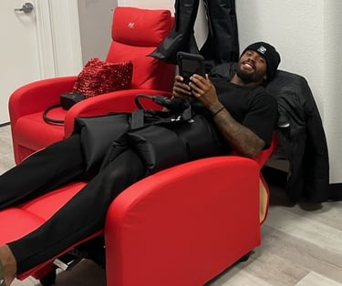 Ameer Abdullah using Normatec Hip Compression treatment