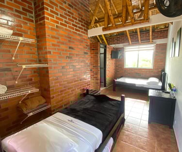 Cabaña con dos camas en el Hotel Palmas de Santa Helena Quimbaya Quindío