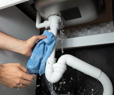 Suasana Plumbing services fixing basin u-trap leak with adjustable wrench