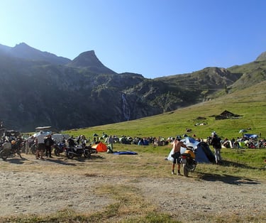 a group of people standing at Stella Alpina around a mountain