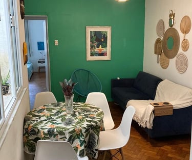 a dining room table with a table and chairs