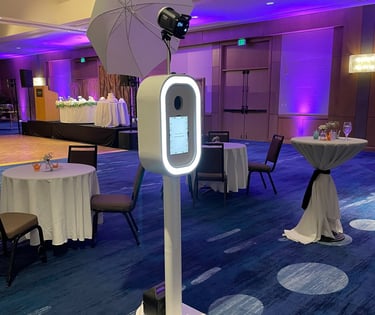 a table with a white umbrella and a white umbrella