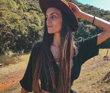 a woman in a hat and a hat