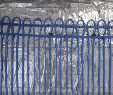 The capillary tube mats are laid and fixed on the insulation.