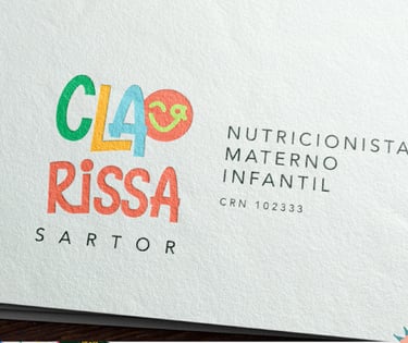 a close up of a business card with a colorful logo
