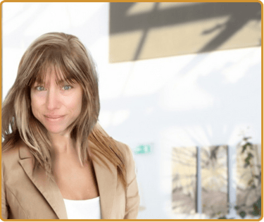 image of Cortney Duval in tan work jacket and white shirt