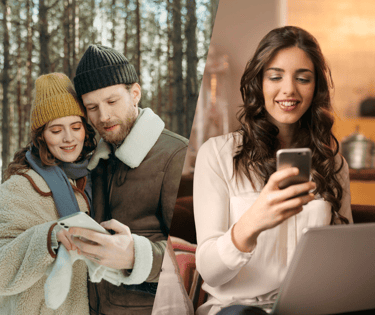 a man and woman are looking at their cell phones