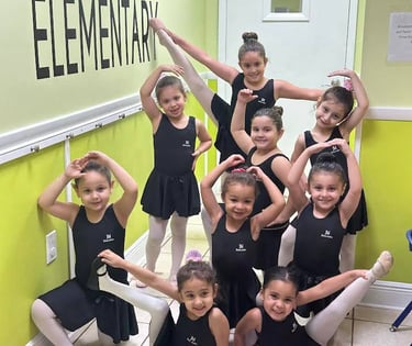 a group of young girls in black leoperlance outfits FANTASTIC LAND LEARNING CENTER