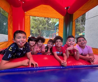 a group of children in a bouncer FANTASTIC LAND LEARNING CENTER