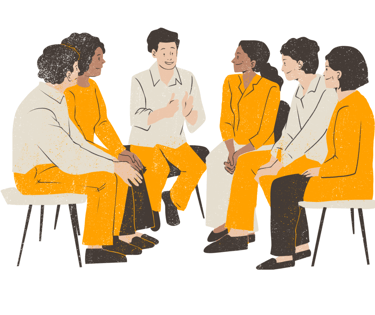 eine Gruppe von diversen Menschen, die in einem Kreis zusammensitzen