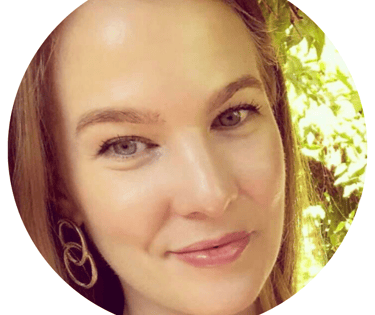 a woman with a large earring and earrings