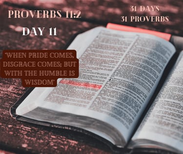 An open Bible displays Proverbs 11:2
