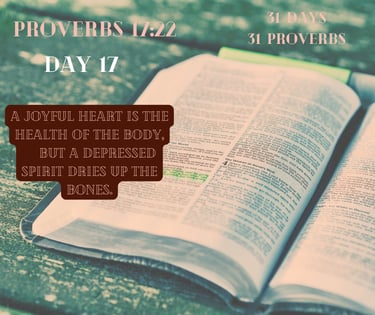 An open Bible displays Proverbs 17:22